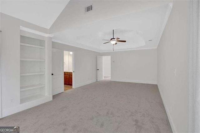 bathroom with crown molding, a shower stall, vanity, and baseboards
