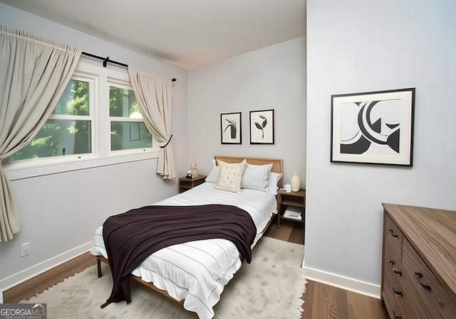 1907 Shalimar Dr NE, Atlanta, GA 30345 - bedroom featuring baseboards and wood finished floors