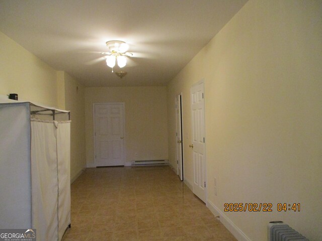 carpeted spare room with visible vents and baseboards