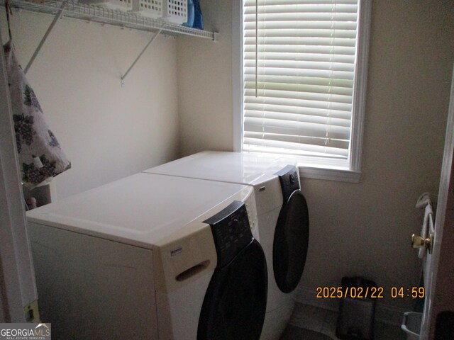 laundry area featuring washer and dryer and laundry area