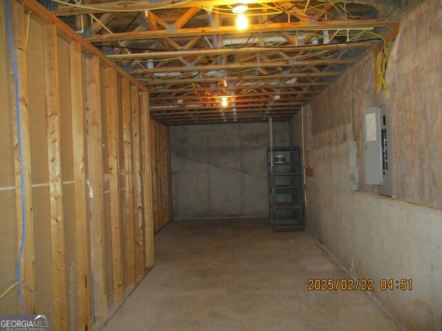 unfinished below grade area with electric panel