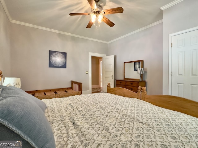 bedroom with crown molding, baseboards, and ceiling fan