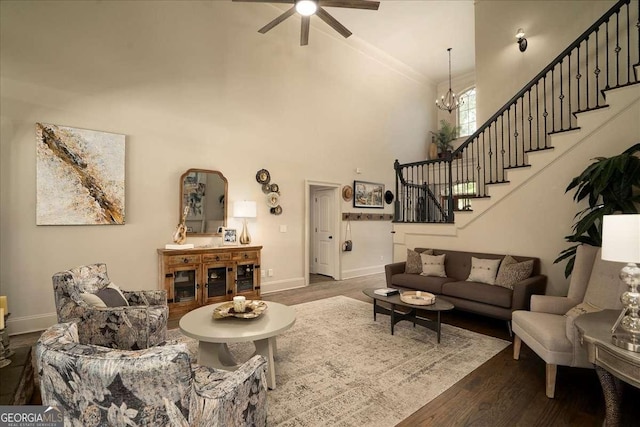175 Tillman Ln, Athens, GA 30606 - living area with stairs, wood finished floors, high vaulted ceiling, a ceiling fan, and baseboards