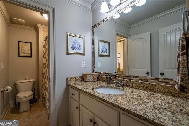 175 Tillman Ln, Athens, GA 30606 - full bathroom with vanity, toilet, tile patterned flooring, baseboards, and crown molding