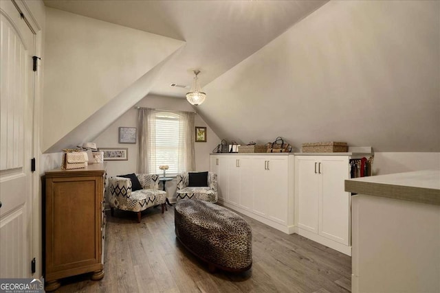 175 Tillman Ln, Athens, GA 30606 - living area featuring wood finished floors and vaulted ceiling