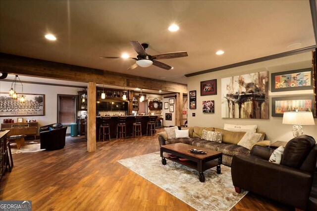 175 Tillman Ln, Athens, GA 30606 - living area featuring dark wood-style flooring, ceiling fan, bar area, recessed lighting, and crown molding
