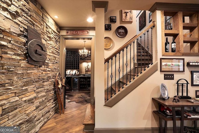 175 Tillman Ln, Athens, GA 30606 - wine area featuring wood finished floors and a chandelier