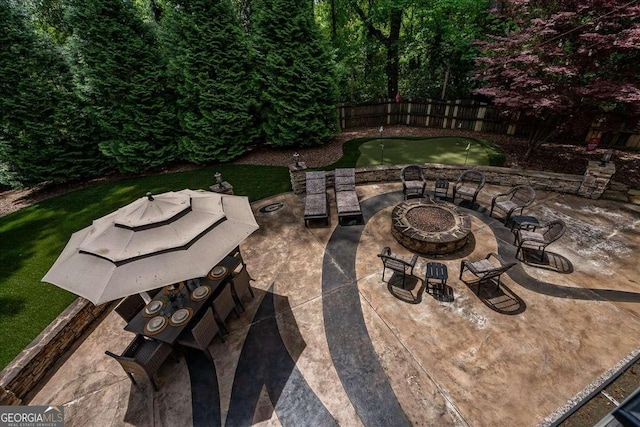 175 Tillman Ln, Athens, GA 30606 - view of patio with an area to practice putting and a fire pit