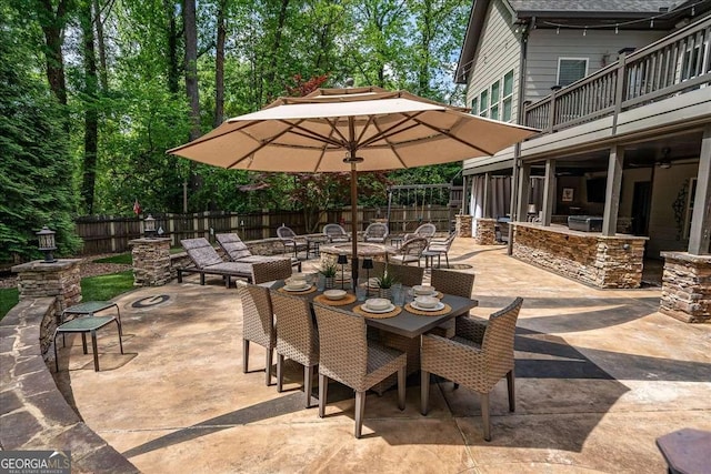 175 Tillman Ln, Athens, GA 30606 - view of patio with an outdoor fire pit, outdoor dining space, an outdoor kitchen, and a balcony
