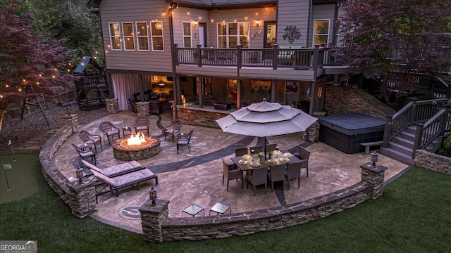 175 Tillman Ln, Athens, GA 30606 - back of house with stairway, an outdoor fire pit, and a patio area