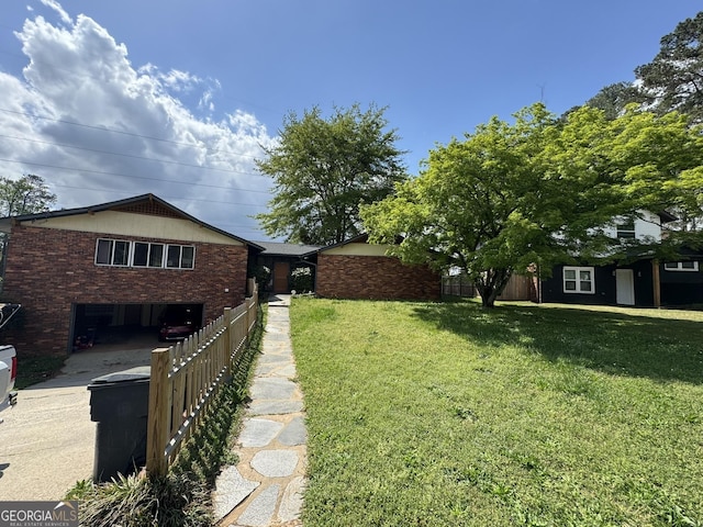 2461 Mcalpin Ter, East Point, GA 30344 - view of yard featuring concrete driveway