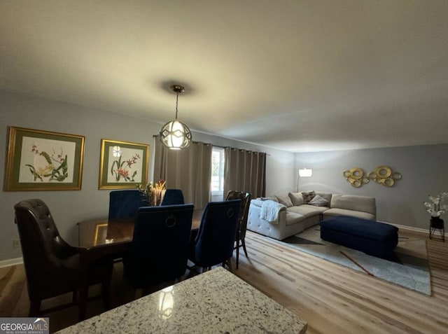 2461 Mcalpin Ter, East Point, GA 30344 - dining area featuring wood finished floors and baseboards