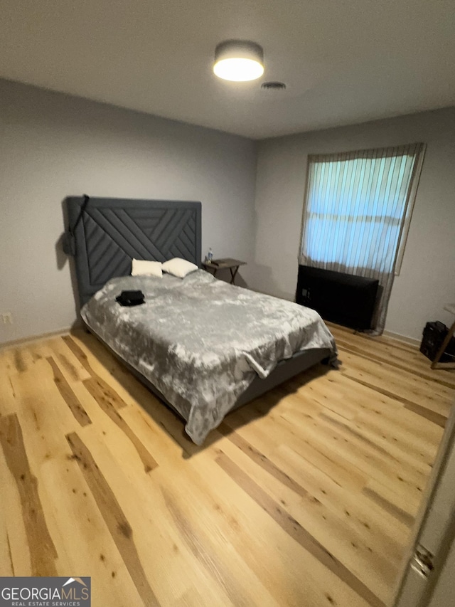 2461 Mcalpin Ter, East Point, GA 30344 - bedroom with wood finished floors