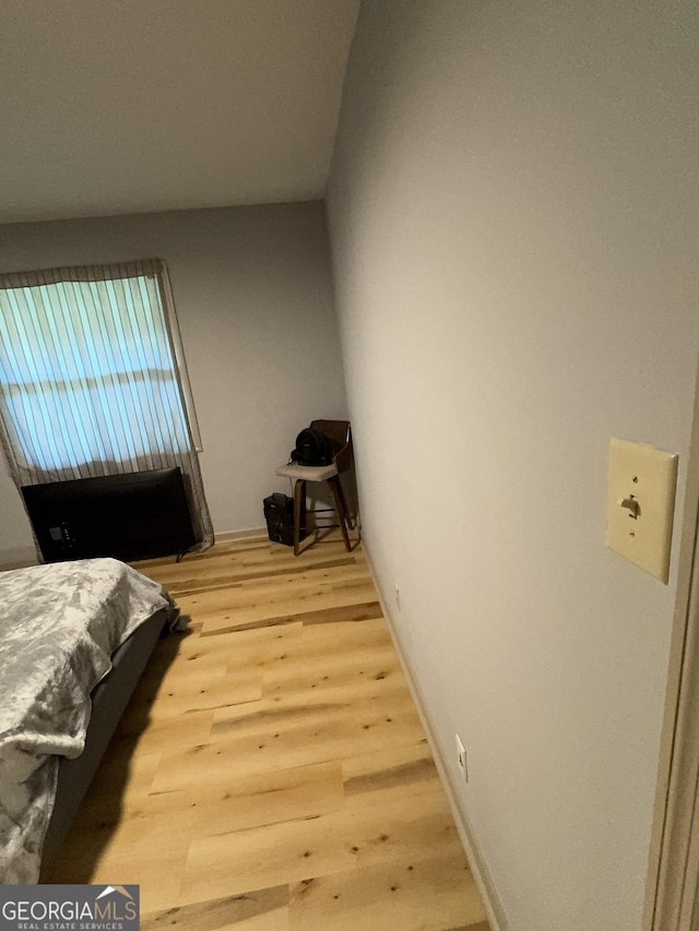 2461 Mcalpin Ter, East Point, GA 30344 - bedroom featuring light wood-style floors and baseboards