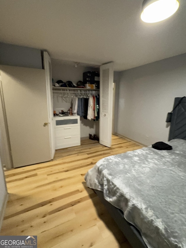 2461 Mcalpin Ter, East Point, GA 30344 - bedroom with light wood finished floors and a closet