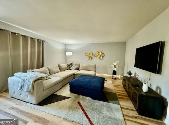 2461 Mcalpin Ter, East Point, GA 30344 - living room with wood finished floors and baseboards