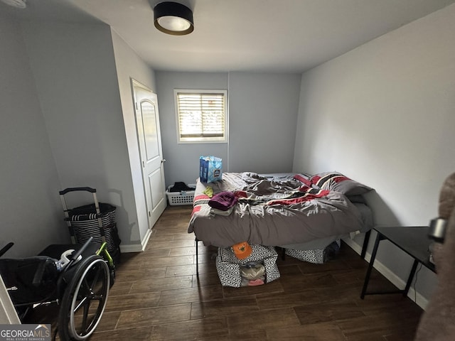 2461 Mcalpin Ter, East Point, GA 30344 - bedroom featuring dark wood-style flooring and baseboards