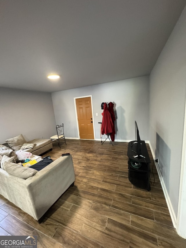 2461 Mcalpin Ter, East Point, GA 30344 - living room featuring dark wood-style flooring and recessed lighting