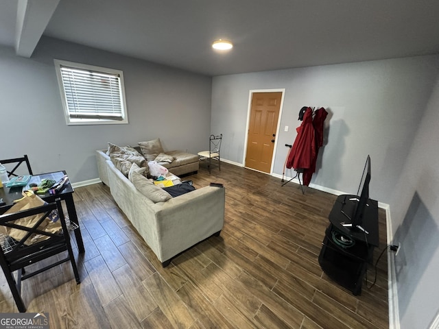 2461 Mcalpin Ter, East Point, GA 30344 - living room featuring dark wood finished floors and baseboards