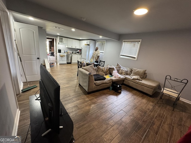 2461 Mcalpin Ter, East Point, GA 30344 - living area with wood finished floors and recessed lighting
