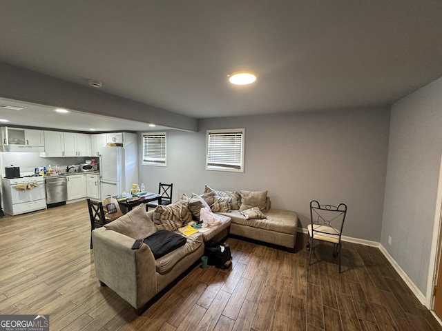 2461 Mcalpin Ter, East Point, GA 30344 - living area with light wood finished floors and recessed lighting