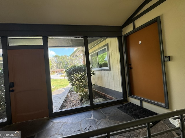 2461 Mcalpin Ter, East Point, GA 30344 - doorway to outside featuring vaulted ceiling