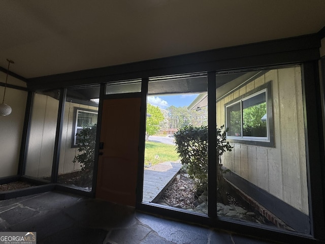 2461 Mcalpin Ter, East Point, GA 30344 - doorway to outside featuring stone finish floors