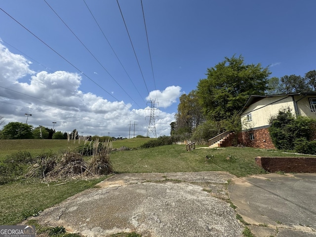 2461 Mcalpin Ter, East Point, GA 30344 - view of grassy yard featuring stairway