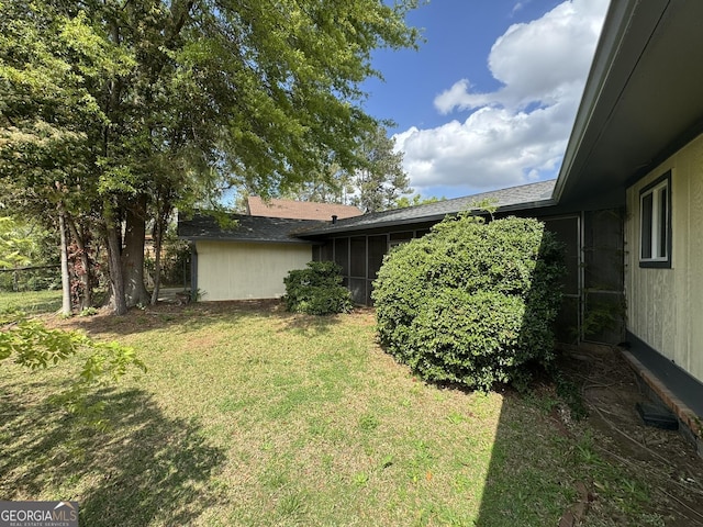 2461 Mcalpin Ter, East Point, GA 30344 - view of green lawn with a sunroom