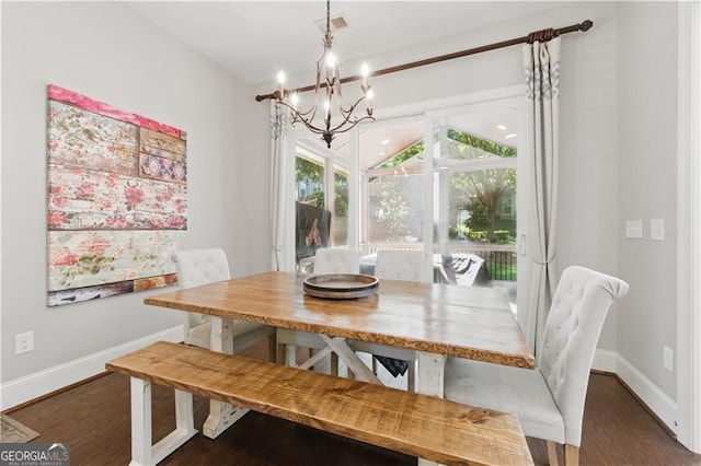 3883 Wakefield Hall Sq SE, Smyrna, GA 30080 - dining space with a chandelier, baseboards, and wood finished floors