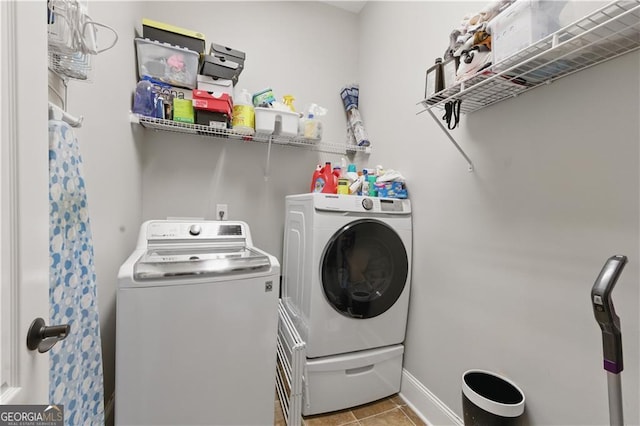 3883 Wakefield Hall Sq SE, Smyrna, GA 30080 - laundry room featuring separate washer and dryer, tile patterned flooring, and baseboards