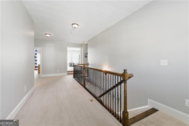 3883 Wakefield Hall Sq SE, Smyrna, GA 30080 - corridor featuring an upstairs landing, baseboards, and carpet floors