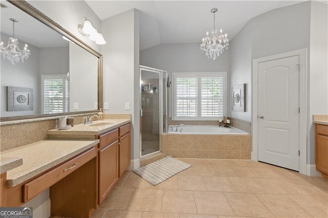 3883 Wakefield Hall Sq SE, Smyrna, GA 30080 - bathroom with a chandelier, vanity, a shower stall, a bath, and lofted ceiling