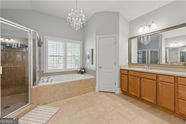 3883 Wakefield Hall Sq SE, Smyrna, GA 30080 - full bath featuring lofted ceiling, vanity, a stall shower, a bath, and a chandelier