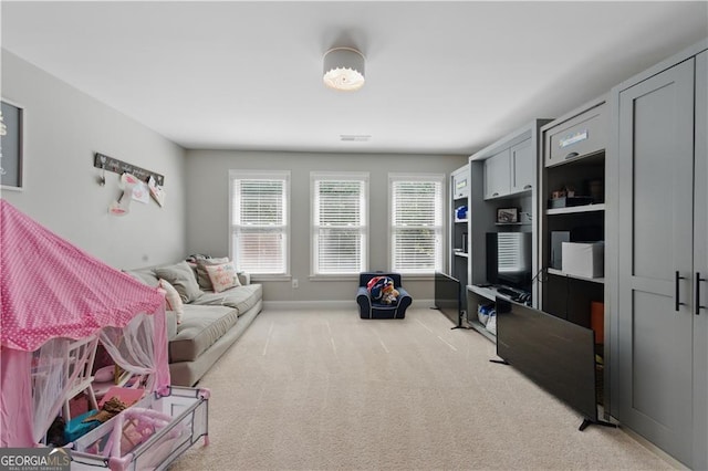3883 Wakefield Hall Sq SE, Smyrna, GA 30080 - carpeted living area featuring baseboards