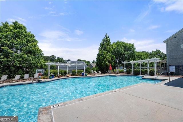 3883 Wakefield Hall Sq SE, Smyrna, GA 30080 - community pool with a pergola, a patio, and view of scattered trees