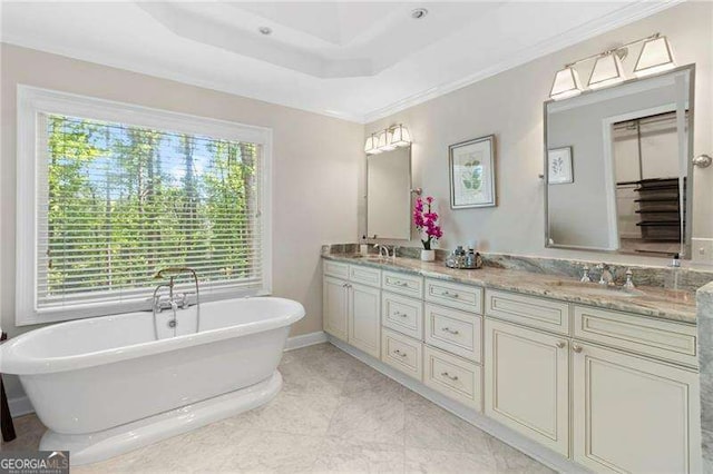 5790 Heards Forest Dr, Atlanta, GA 30328 - full bath featuring double vanity, a sink, a freestanding tub, and ornamental molding