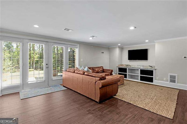 5790 Heards Forest Dr, Atlanta, GA 30328 - living room with ornamental molding, french doors, recessed lighting, visible vents, and dark wood-style floors