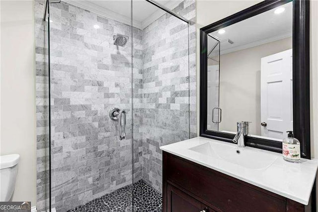 5790 Heards Forest Dr, Atlanta, GA 30328 - bathroom featuring crown molding, toilet, a shower stall, and vanity
