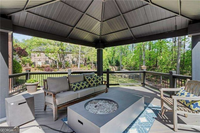 5790 Heards Forest Dr, Atlanta, GA 30328 - wooden deck featuring an outdoor living space with a fire pit
