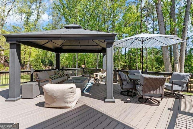 5790 Heards Forest Dr, Atlanta, GA 30328 - wooden deck with a gazebo, outdoor dining area, and an outdoor living space with a fire pit