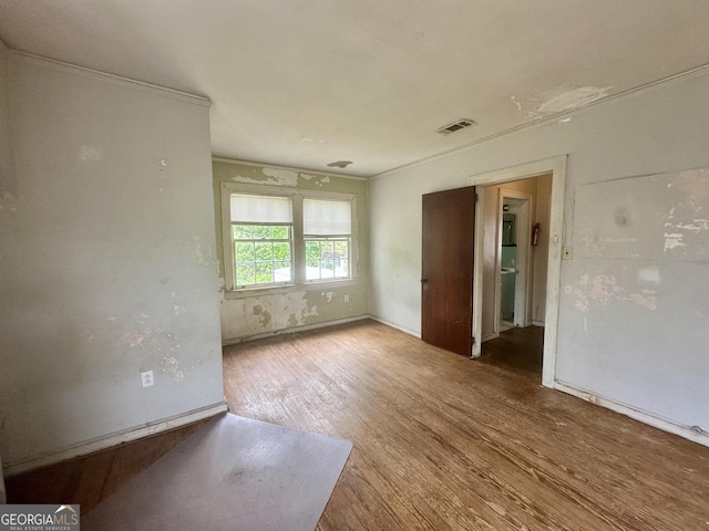 623 Mcdonald St, Waycross, GA 31503 - empty room featuring wood finished floors and baseboards