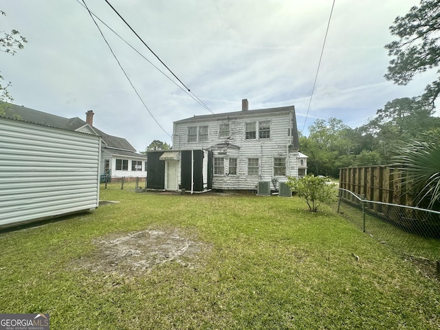 623 Mcdonald St, Waycross, GA 31503 - back of house featuring a shed