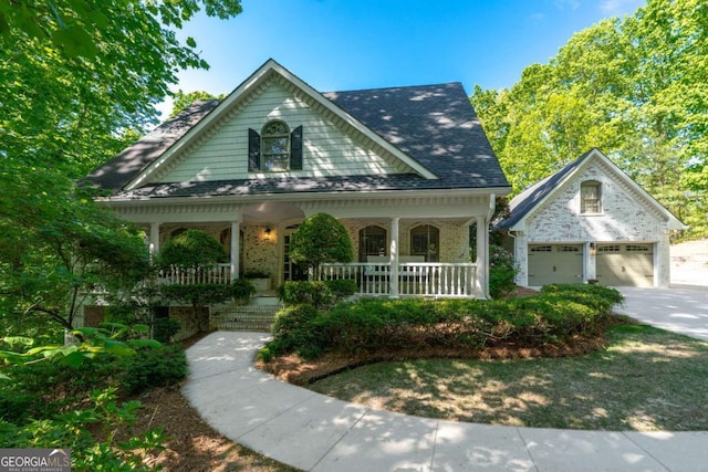 1811 Fountain Hill Ct, Duluth, GA 30097 - victorian home with covered porch, a garage, brick siding, and concrete driveway