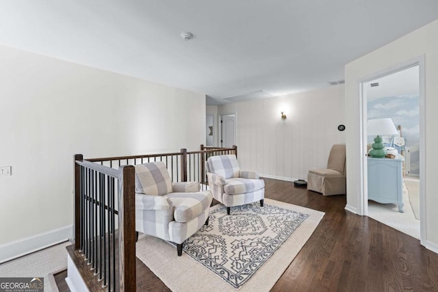 1811 Fountain Hill Ct, Duluth, GA 30097 - sitting room with wood finished floors, baseboards, and an upstairs landing