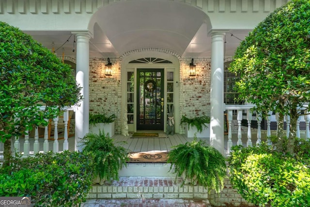 1811 Fountain Hill Ct, Duluth, GA 30097 - view of exterior entry featuring brick siding and a porch