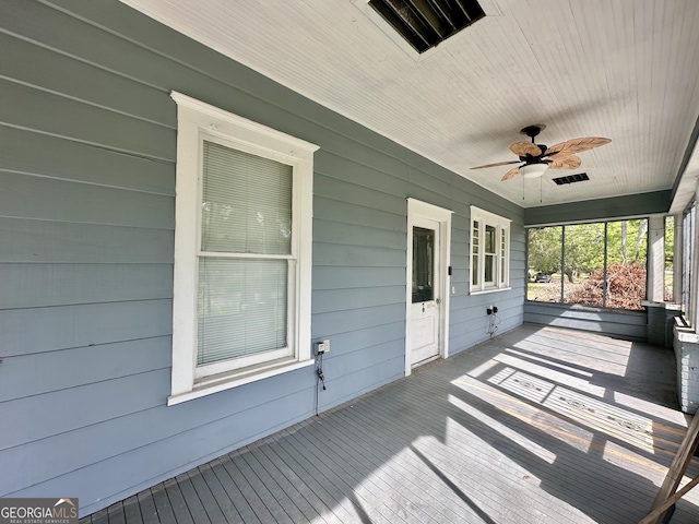 2409 Dorothy St, Waycross, GA 31501 - deck featuring a ceiling fan and covered porch