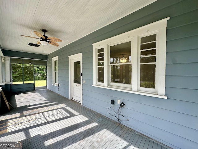 2409 Dorothy St, Waycross, GA 31501 - deck with a ceiling fan and covered porch