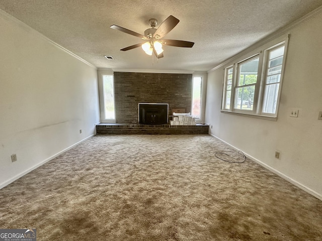 2409 Dorothy St, Waycross, GA 31501 - unfurnished living room with ornamental molding, carpet flooring, healthy amount of natural light, a textured ceiling, and ceiling fan