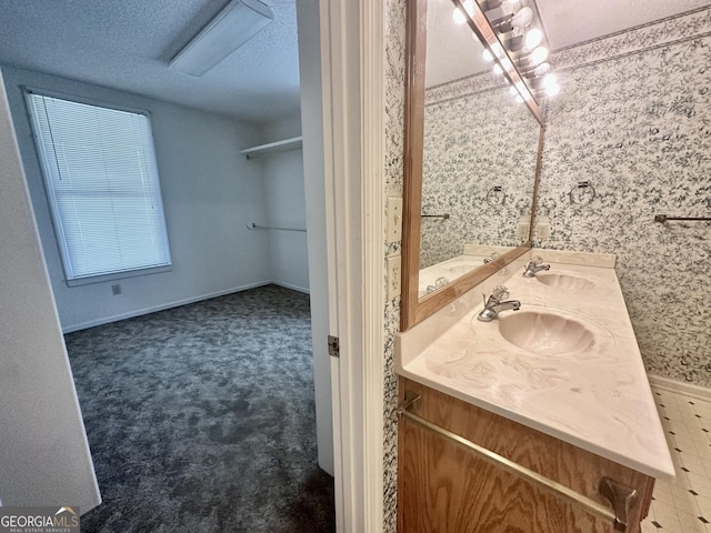 2409 Dorothy St, Waycross, GA 31501 - full bath featuring double vanity and a textured ceiling